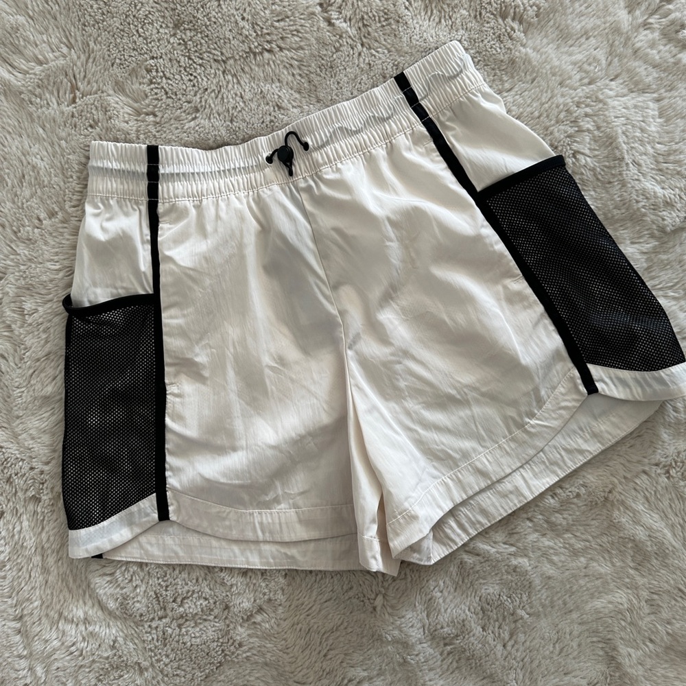The North Face Women's white Dune Windwall Shorts
